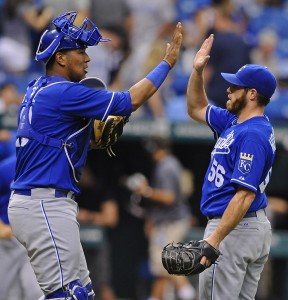 This is a giant man playing catcher