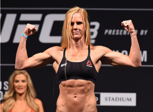 Act like I didn't see this picture and say she wouldn't whoop up on Rousey.